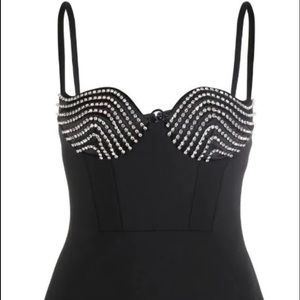 AREA
stud-embellished bustier black mini dress.  Made in Italy